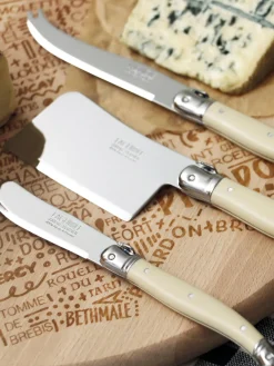 Cuchillos De Cocina Y Bloques|Cuchillos De Queso>Laguiole Cuchillos para queso Debutant, 3 uds. Hojas: plateado pulido espejoMangos: blanco Off WhiteRecipiente: madera clara
