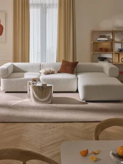 Discount Sofá modular en tejido bouclé Anton (4 plazas), con reposapiés (izquierda/derecha) Sofás