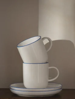 Tazas Y Mugs|Vajillas Completas>Westwing Collection Tazas con platitos de porcelana Facile, 2 uds. Blanco Off White con borde azul oscuro